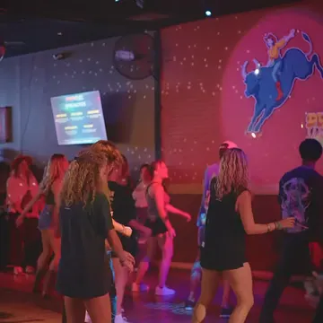 The dance floor below the mural late at night